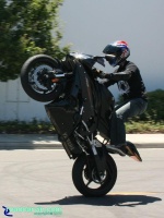 Raven R6 - Standup Wheelie I: Raven R6 Yamaha rider doing a high standup wheelie. The bike was really clean and had a crash cage and frame sliders.